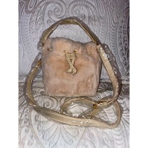 Brand New adjustable faux fur Purse